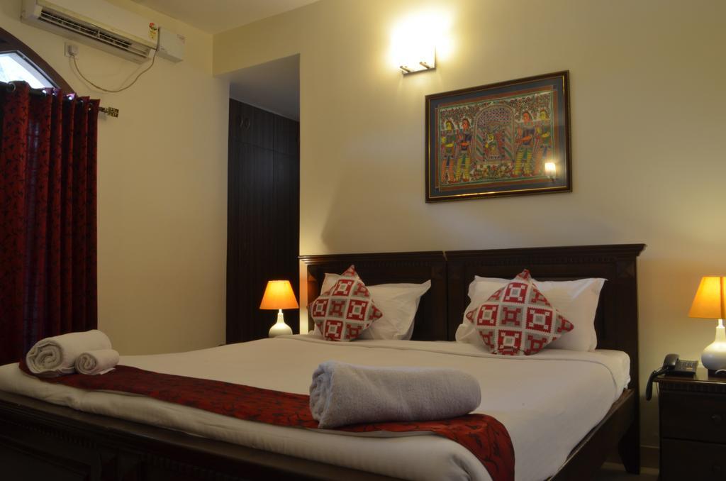 Luxtay Suites Bangalore Kamer foto