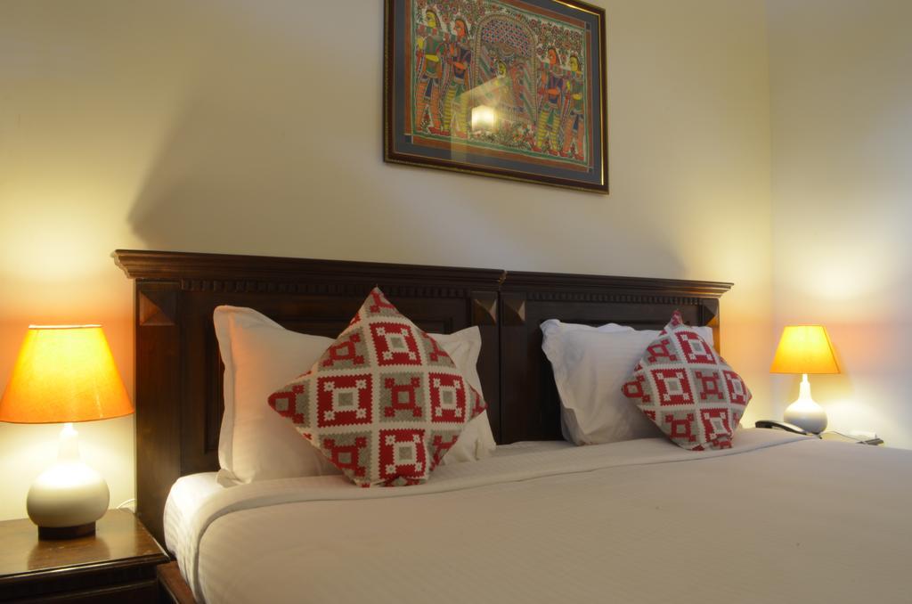 Luxtay Suites Bangalore Kamer foto