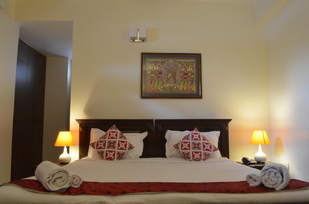 Luxtay Suites Bangalore Kamer foto